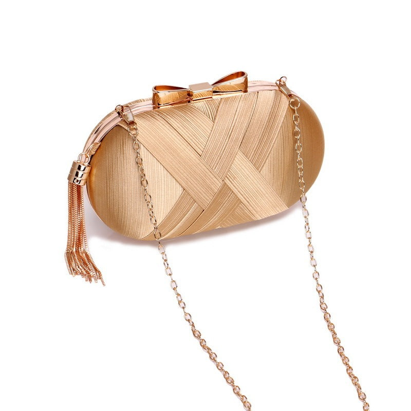 The AllureTassel Clutch