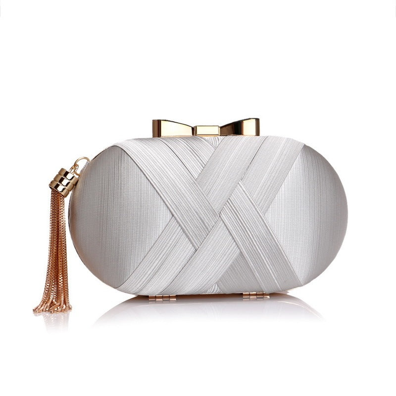 The AllureTassel Clutch