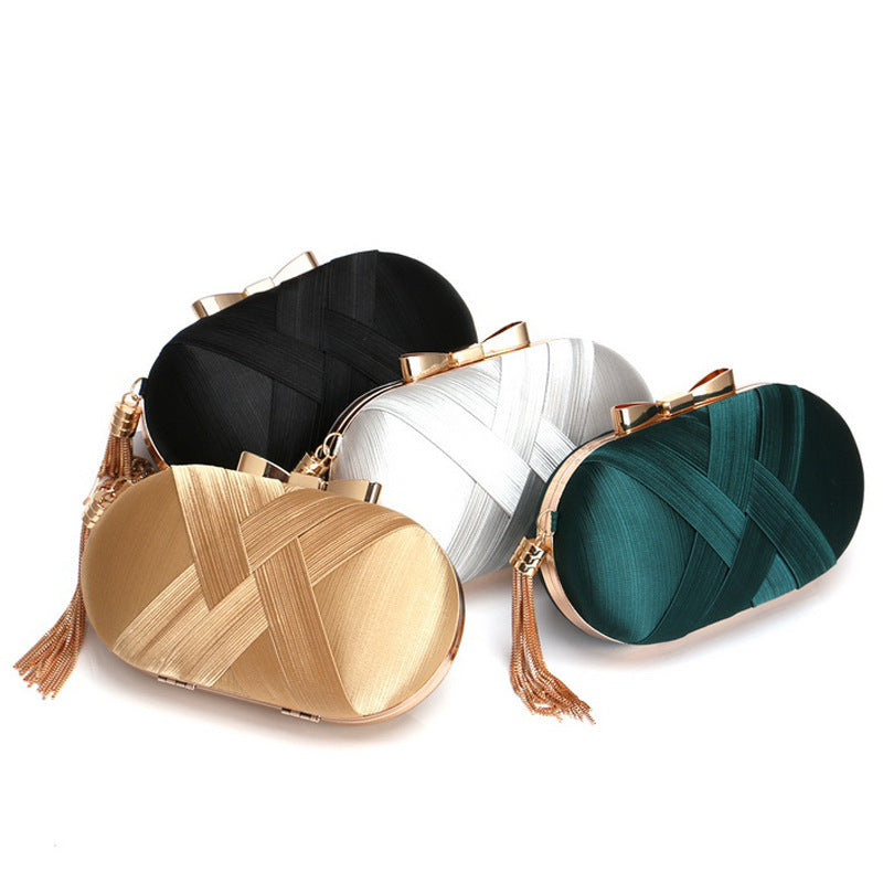 The AllureTassel Clutch