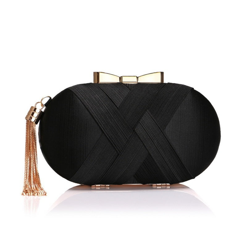 The AllureTassel Clutch