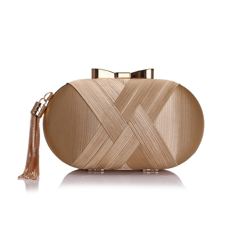 The AllureTassel Clutch